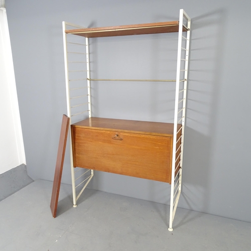 2737 - A mid-century Staples Ladderax wall unit, with two shelves and fall-front cabinet. Lacking one brass... 