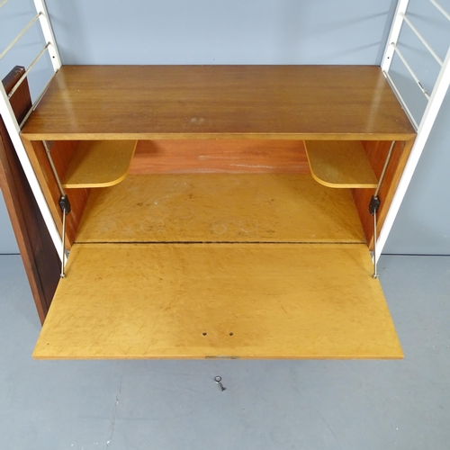 2737 - A mid-century Staples Ladderax wall unit, with two shelves and fall-front cabinet. Lacking one brass... 