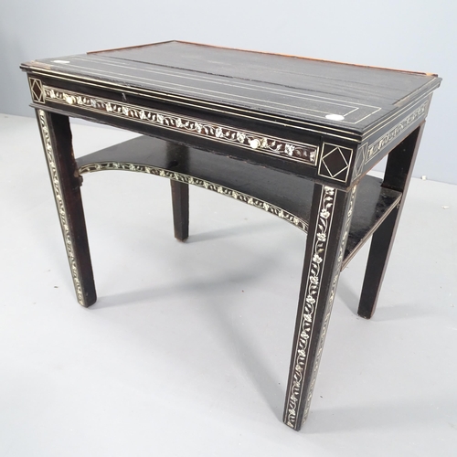 2743 - An antique ebonised two-tier side table, with felted slide and bone inlaid decoration. 57x50x48cm.