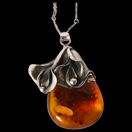 1206 - An Art Nouveau 925 silver amber floral pendant necklace