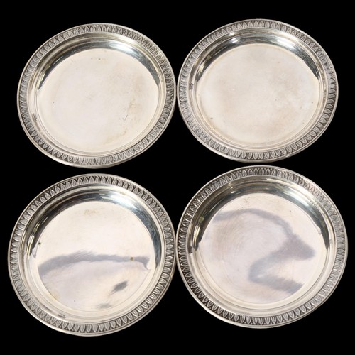 1204 - A set of 4 small silver dishes, with embossed edge, all marked 29po