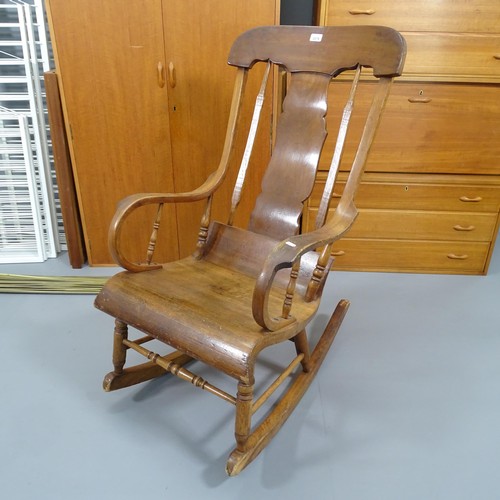 2278 - An oak and mahogany Boston rocking chair.