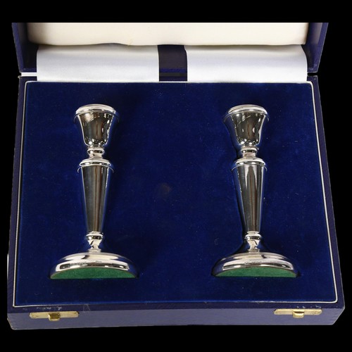 1201 - A pair of Elizabeth II silver candlesticks of small size, H12cm, hallmarks for Birmingham 1988, boxe... 