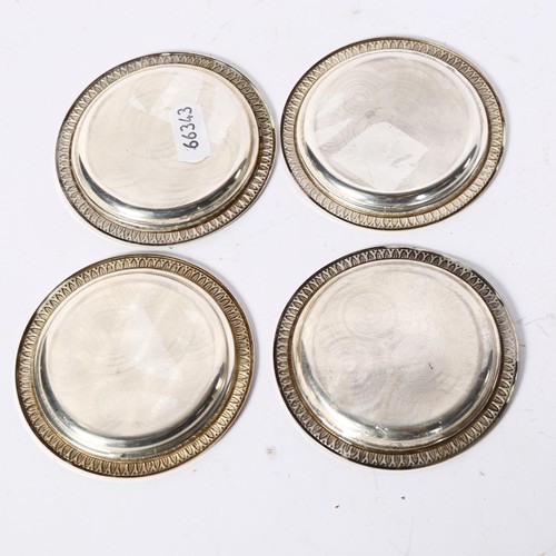 1204 - A set of 4 small silver dishes, with embossed edge, all marked 29po