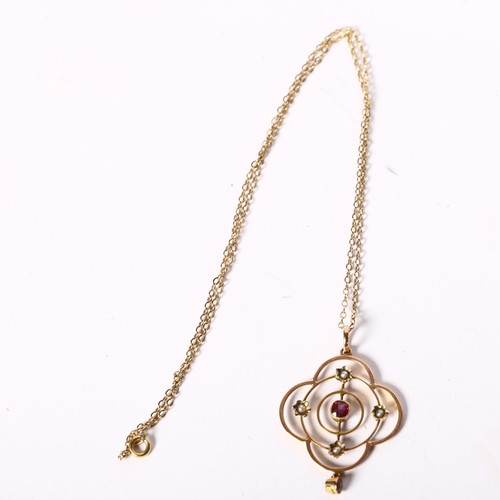 1208 - A delicate 9ct gold seed pearl and amethyst set pendant and chain, 3.2g