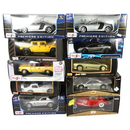 65 - Maisto - a quantity of diecast vehicles. Some in boxes and with stands. Including Special edition hu... 