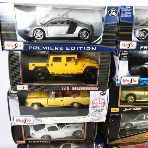 65 - Maisto - a quantity of diecast vehicles. Some in boxes and with stands. Including Special edition hu... 