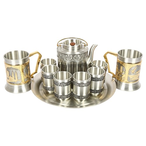 670 - A collection of Selwin pewter, including 6 goblets, pair of tankards, coffee pot and serving tray