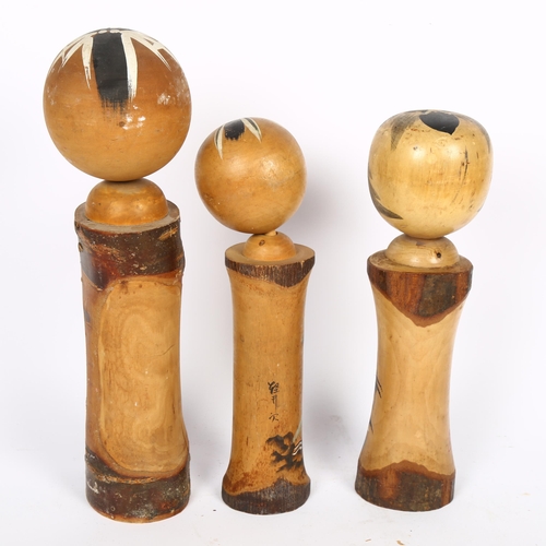 680 - A group of 3 Japanese Kokeshi dolls, H36cm