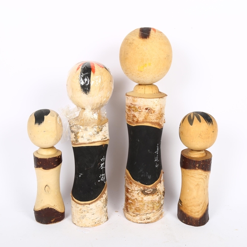 682 - A group of 4 Japanese Kokeshi dolls, H36cm