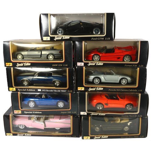 69 - Maisto - Quantity of diecast vehicles, 1:18 scale. In boxes and on stands, including Jaguar XK8 1986... 