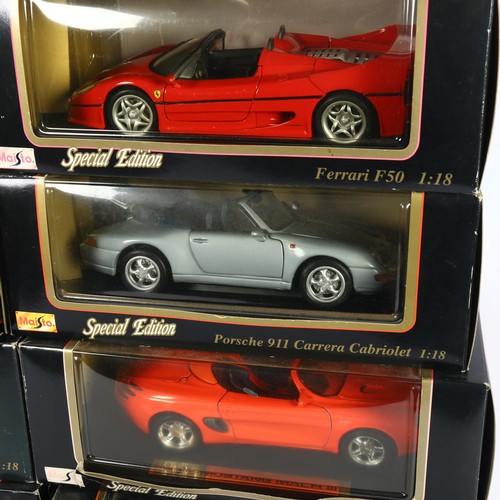 69 - Maisto - Quantity of diecast vehicles, 1:18 scale. In boxes and on stands, including Jaguar XK8 1986... 