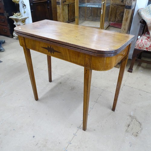 2349 - A 19th century mahogany fold-over tea table. 91x76x44cm