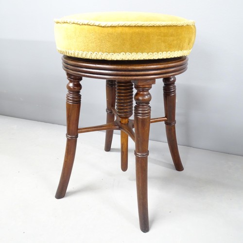 2691 - A Victorian revolving piano stool.