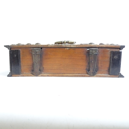 342 - A 19th century walnut and ebony travelling box, studded brass mounted, with fitted interior, with br... 