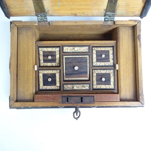 342 - A 19th century walnut and ebony travelling box, studded brass mounted, with fitted interior, with br... 