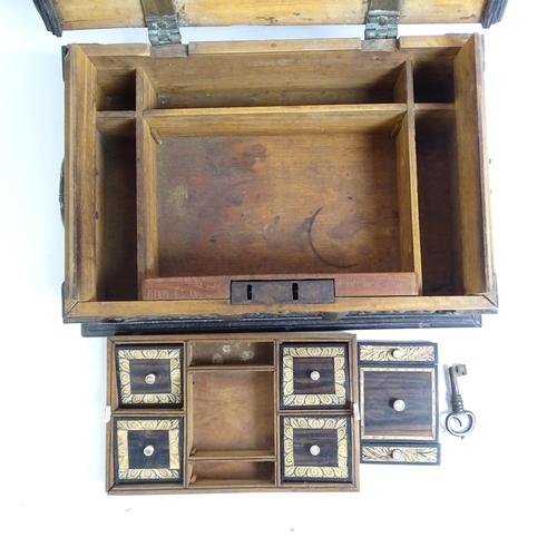 342 - A 19th century walnut and ebony travelling box, studded brass mounted, with fitted interior, with br... 