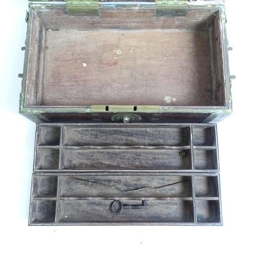 343 - A 19th century Anglo-Indian teak and brass-bound travelling stationery/writing box, with brass carry... 