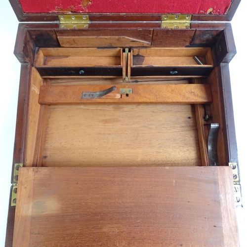 576 - A Victorian mahogany and brass-bound travelling writing slope, L36cm, H13cm, D26cm