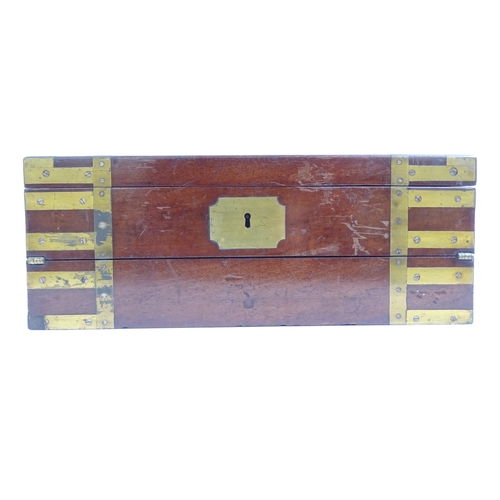 576 - A Victorian mahogany and brass-bound travelling writing slope, L36cm, H13cm, D26cm