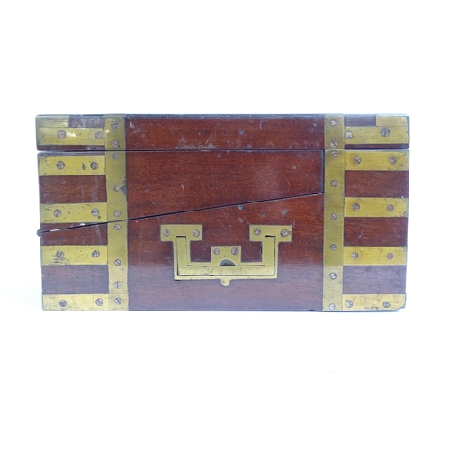 576 - A Victorian mahogany and brass-bound travelling writing slope, L36cm, H13cm, D26cm