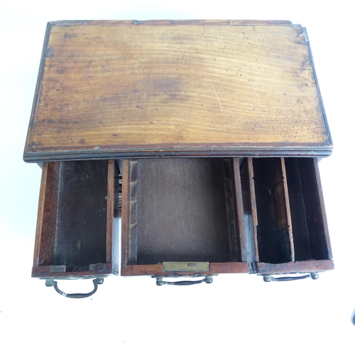 577 - An early 19th century table-top chest of 6 drawers of varying sizes, H29cm, L38cm, D20cm