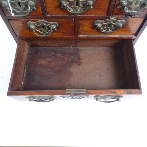 577 - An early 19th century table-top chest of 6 drawers of varying sizes, H29cm, L38cm, D20cm