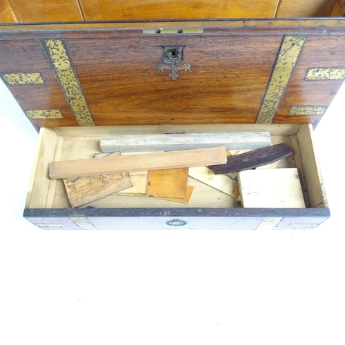 581 - A Victorian mahogany and brass-bound travelling stationery case, H27cm, L36cm, D21cm