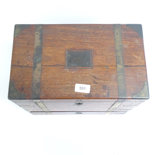 581 - A Victorian mahogany and brass-bound travelling stationery case, H27cm, L36cm, D21cm