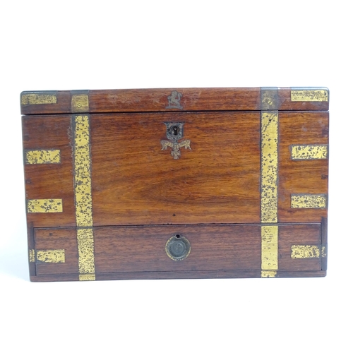 581 - A Victorian mahogany and brass-bound travelling stationery case, H27cm, L36cm, D21cm