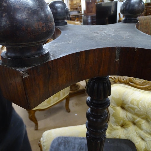 2253 - A 19th century Rosewood rectangular occasional table, on turned and fluted column with platform base... 