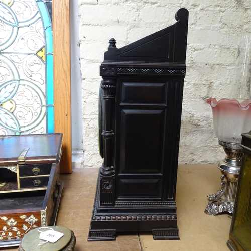 289 - A Victorian Aesthetic Movement ebonised architectural mantel clock, probably designed by Lewis Forem... 