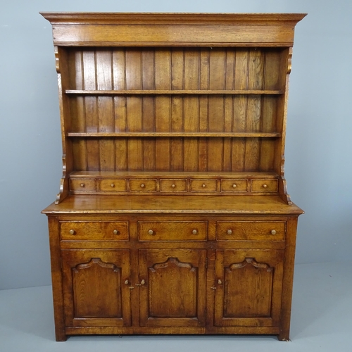 2054 - A two-section Welsh oak dresser. 192x158x54.