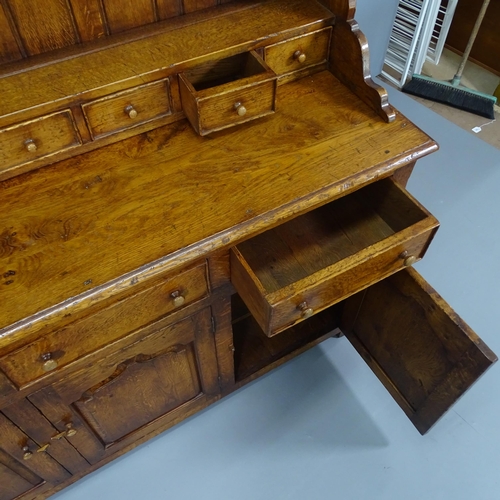 2054 - A two-section Welsh oak dresser. 192x158x54.