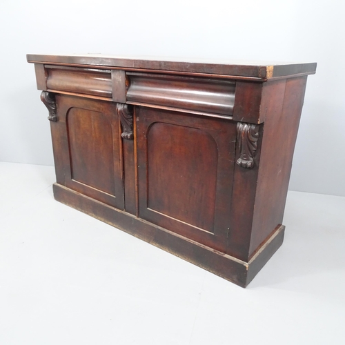 2056 - A Victorian mahogany sideboard, with two frieze drawers and cupboards under. 137x89x51cm.