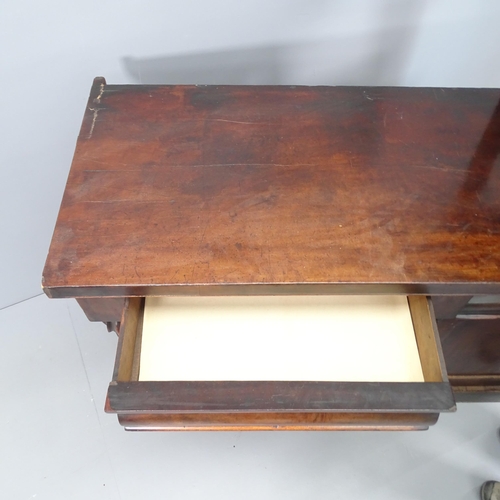 2056 - A Victorian mahogany sideboard, with two frieze drawers and cupboards under. 137x89x51cm.