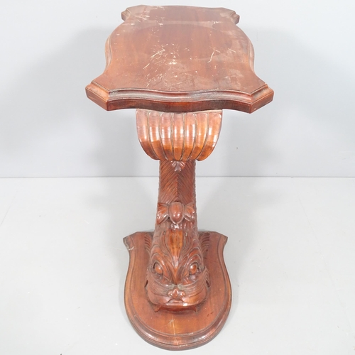 2058 - An oriental mahogany fish design side table. 55x78x40cm.