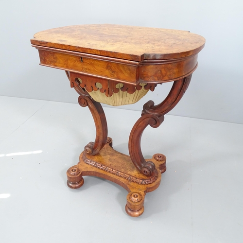 2062 - A Regency burr walnut sewing table. 63x74x46cm