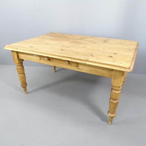 2066 - An antique pine farmhouse kitchen table, with single frieze drawer and raised on turned legs. 155x79... 