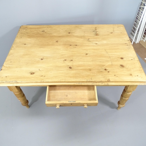 2066 - An antique pine farmhouse kitchen table, with single frieze drawer and raised on turned legs. 155x79... 