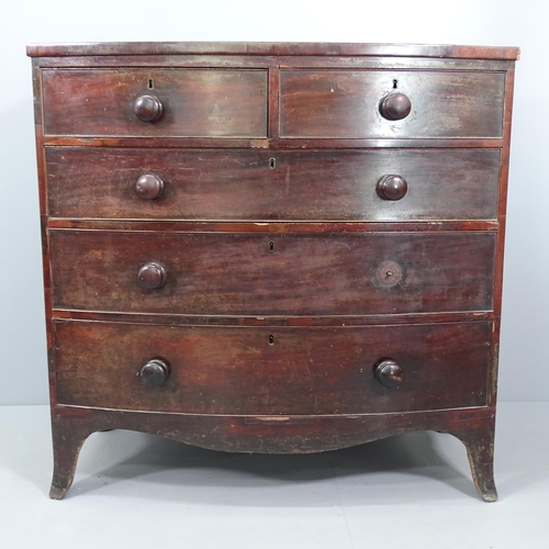 2070 - A Georgian mahogany bow-front chest of two short and three long drawers. 109x106x54cm.