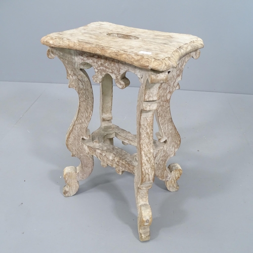 2084 - A continental limed oak stool. 38x58x28cm.