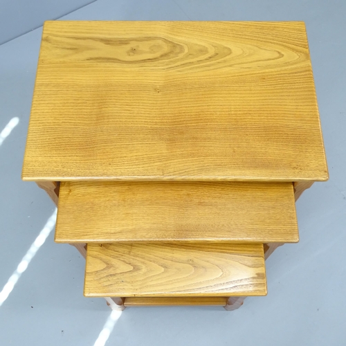 2085 - A nest of three Yorkshire School design oak coffee tables. Largest 61cmx51cmx41cm.