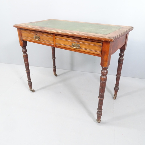 2095 - A Victorian mahogany writing table, with tooled green leather skiver, two frieze drawers and raised ... 