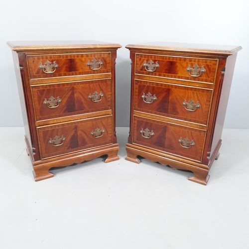 2096 - A pair of modern mahogany and satinwood strung bedside chests of three drawers. 52x69x40cm.