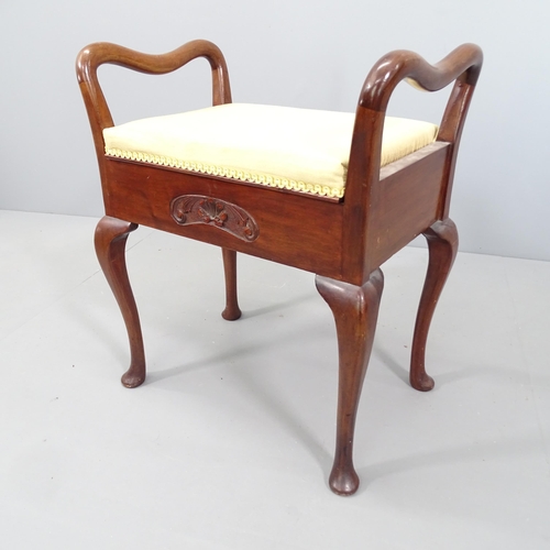 2098 - A 19th century mahogany and upholstered piano stool, with lifting seat and raised on tapered legs wi... 