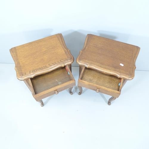 2101 - A pair of French oak bedside tables. 44x70x32cm.