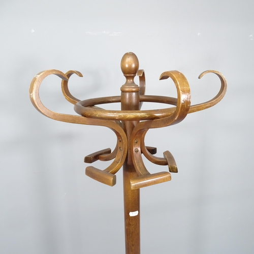 2103 - An early 20th century bentwood hat and coat stand. Height 189cm.