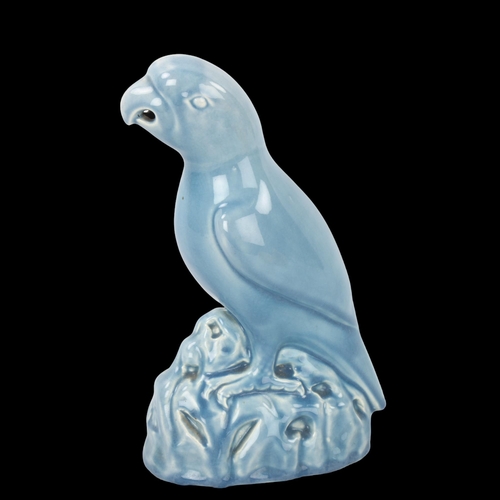 115 - Minton Majolica pale blue glazed parrot, height 22cm