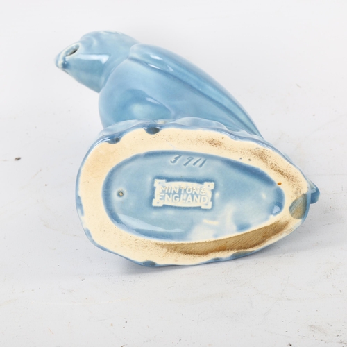 115 - Minton Majolica pale blue glazed parrot, height 22cm